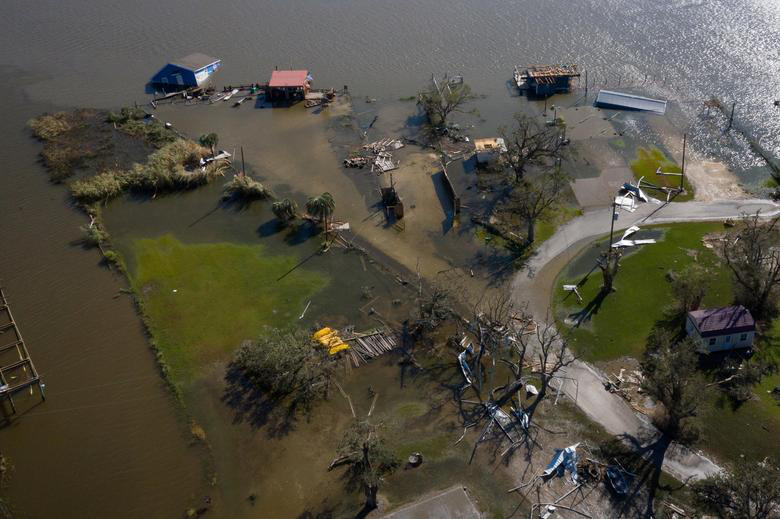 Những bức ảnh thể hiện sự tàn khốc của bão lũ năm 2020 - Ảnh 10.